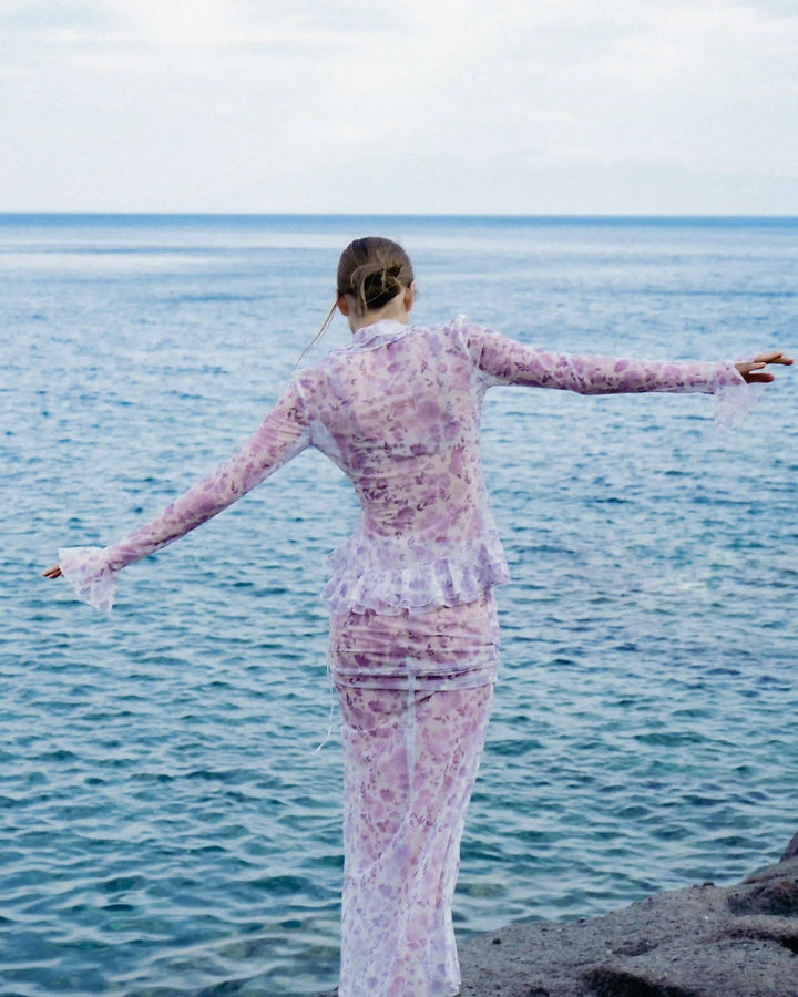 Roxanna mesh, beach blouse with sleeves and ruffles made of ivory mesh with small light pink flowers