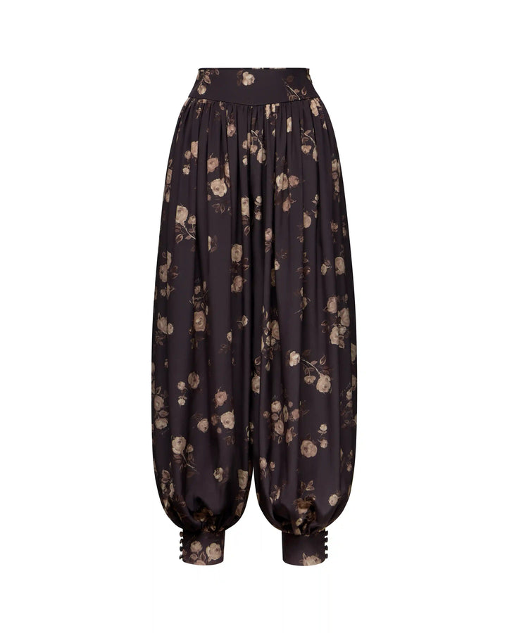 Evie, trousers with ruffles made of chocolate crepe de chine with floral print