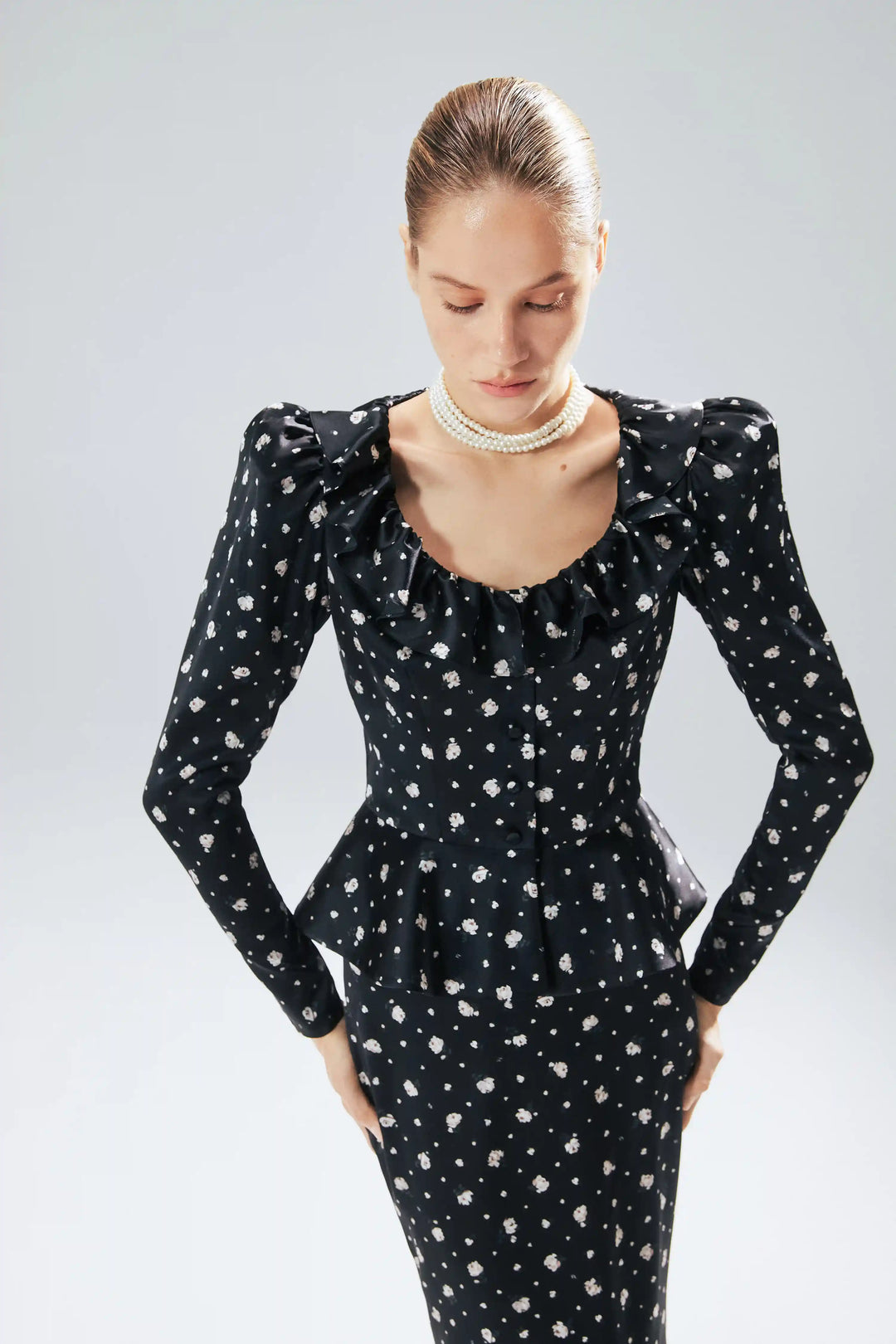 Ri, jacket made of black satin with small floral print