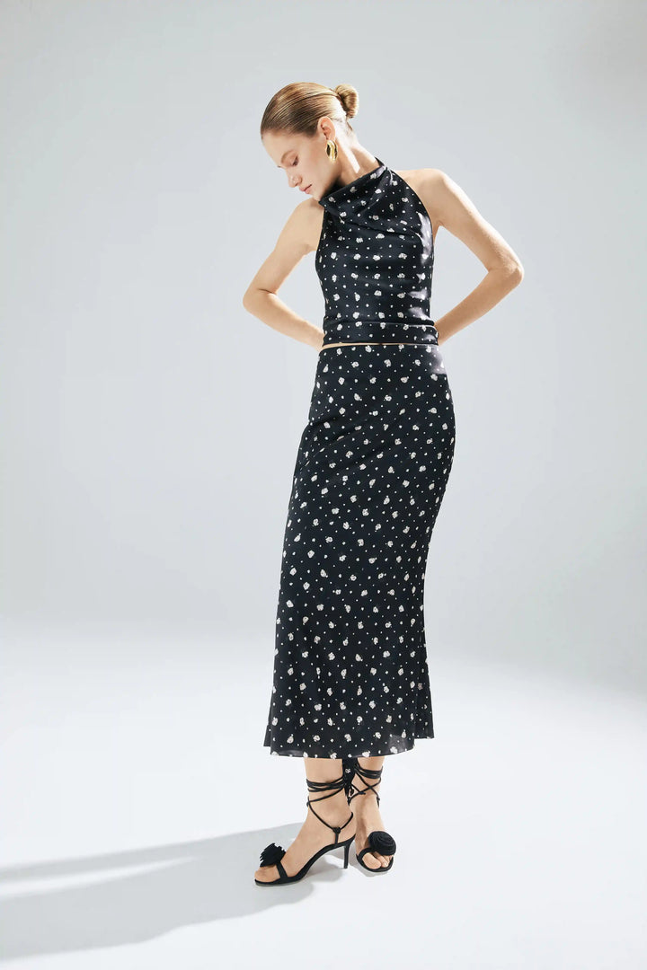 Eliana, top made of black satin with small floral print