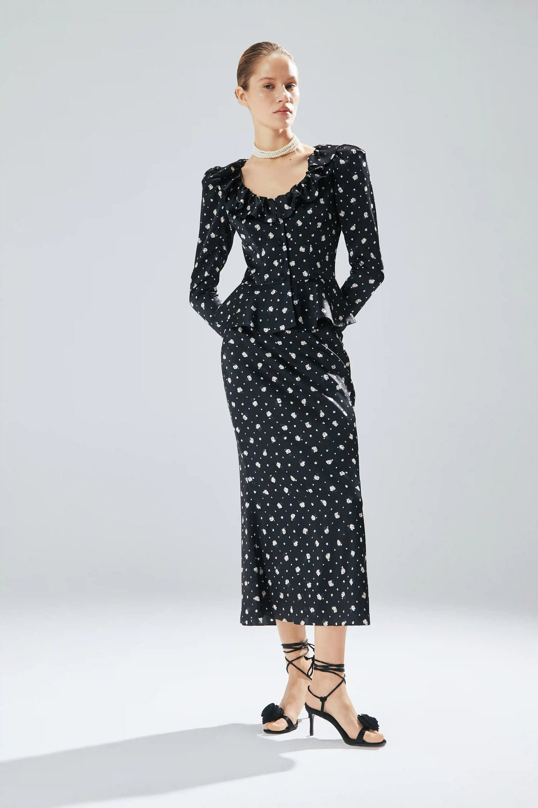 Ri, jacket made of black satin with small floral print