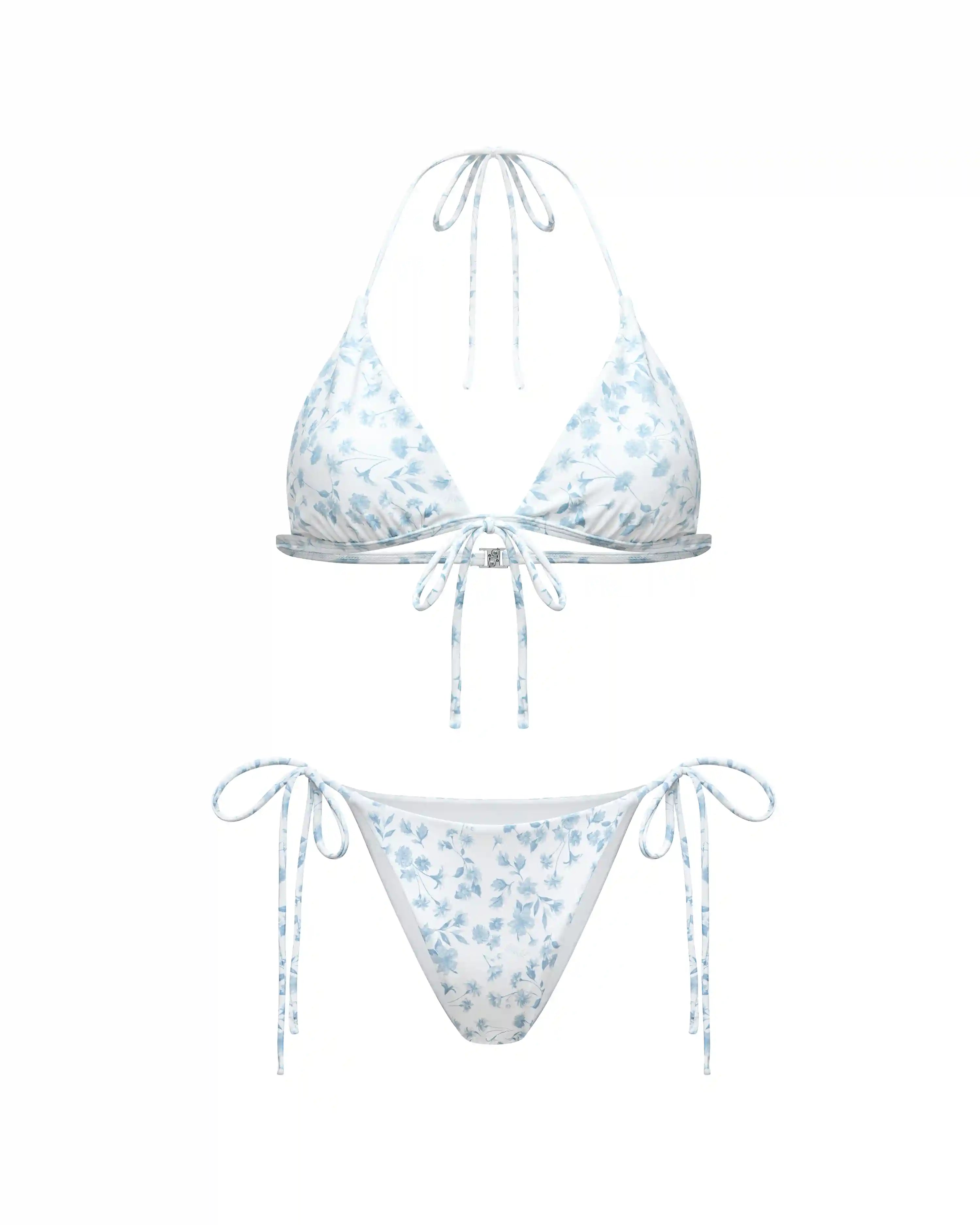 Gill, set of two-piece swimsuit and pareo made of biflex in ivory with small light blue flowers