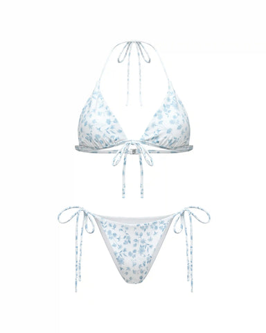 Gill, set of two-piece swimsuit and pareo made of biflex in ivory with small light blue flowers