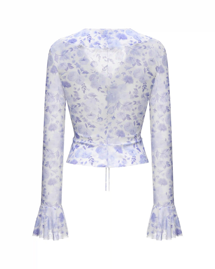Roxanna mesh, beach blouse with sleeves and ruffles made of ivory mesh with medium lilac flowers