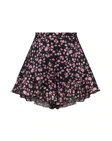 Audrie, mini shorts with ruffles made of black crepe de chine with small light pink flowers